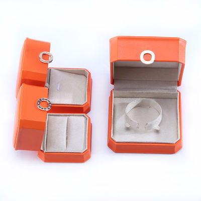 kotak kemasan perhiasan kulit PU persegi oranye untuk gelang kalung dan cincin pernikahan