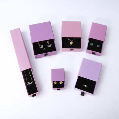 Pabrik grosir Eco Friendly hadiah berkualitas tinggi Kotak Perhiasan Pribadi Cincin Custom Kalung Earring Gelang Kemasan Ungu Karton Kertas Laci Perhiasan Kotak dengan logo